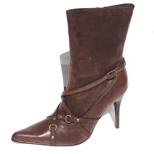 Brown high heeled booties with decorative straps