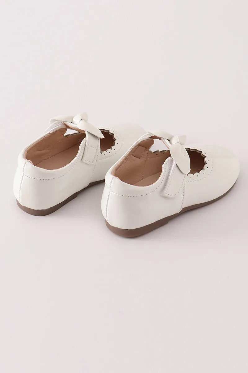 White bow mary jane shoes